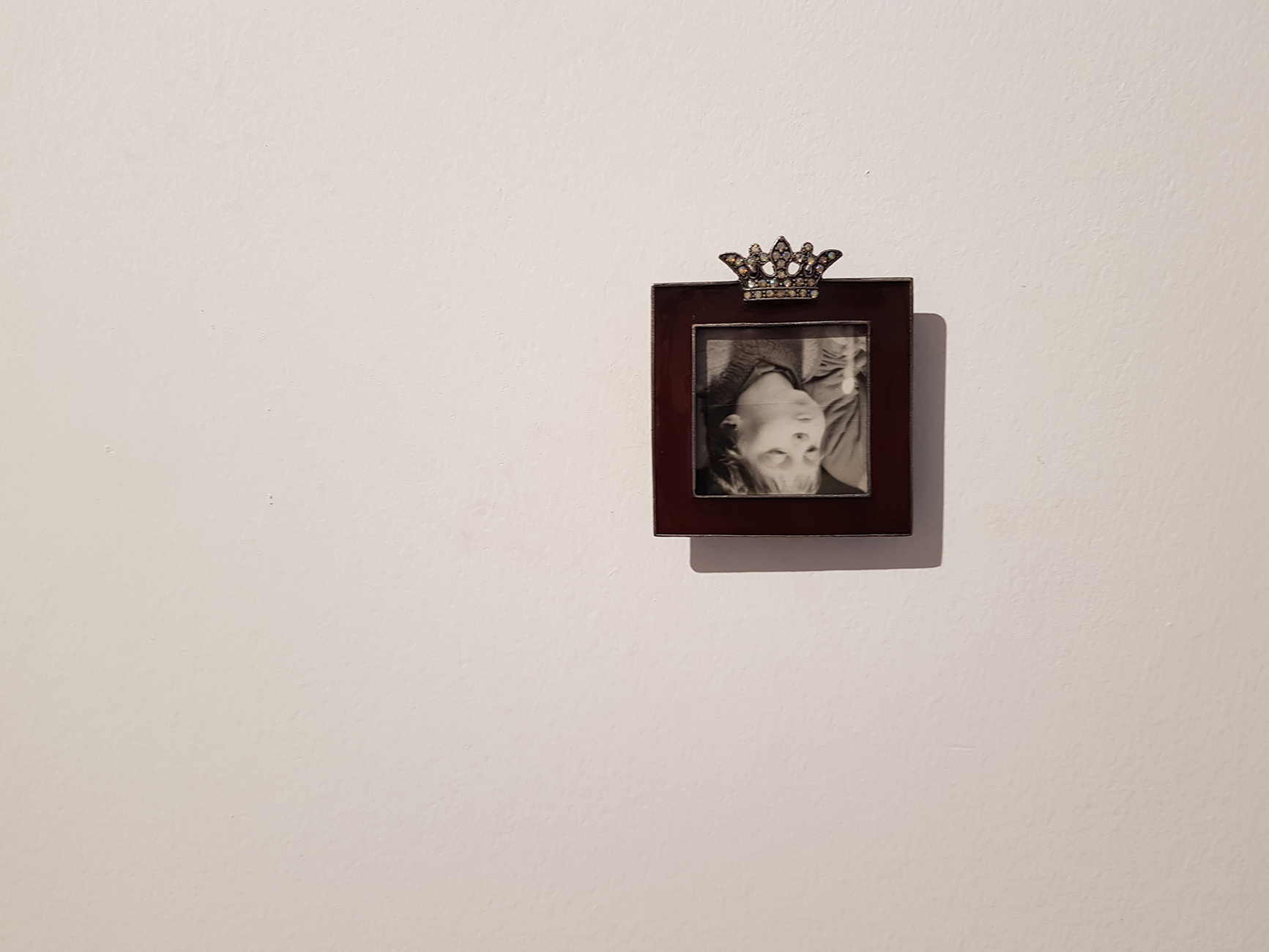 Dust, 2018, photo from artist's archive, photo frame with diamond crown, 5x5cm