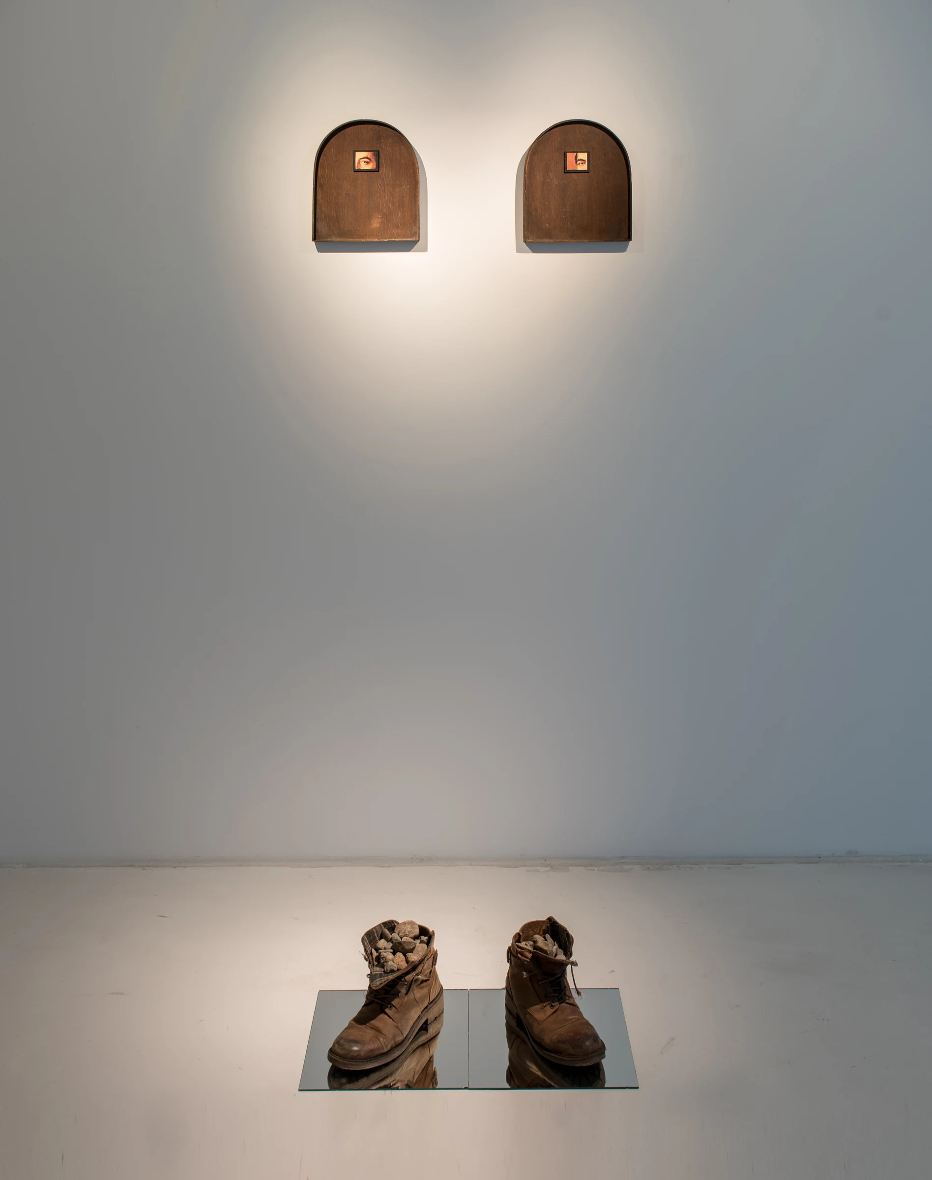 Atom (2018) — shoes, stones, mirror, wood, photograph by Siniša Radulović